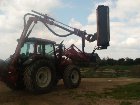 maquina picadora de cotxilles am braç telescopic fins a 6 m d´allargada